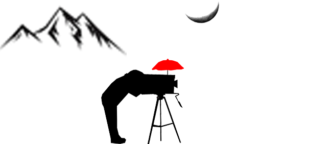 silueta de un fotógrafo minutero y su cámara